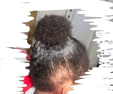 Child before: hair gathered into a small bun