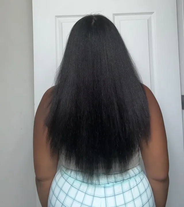 Jasmine today, from the back: straightened hair reaching her lower back